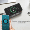 ecoutez votre musique grace au bluetooth Radio réveil chargeur induction devant un smartphone connecté au Bluetooth